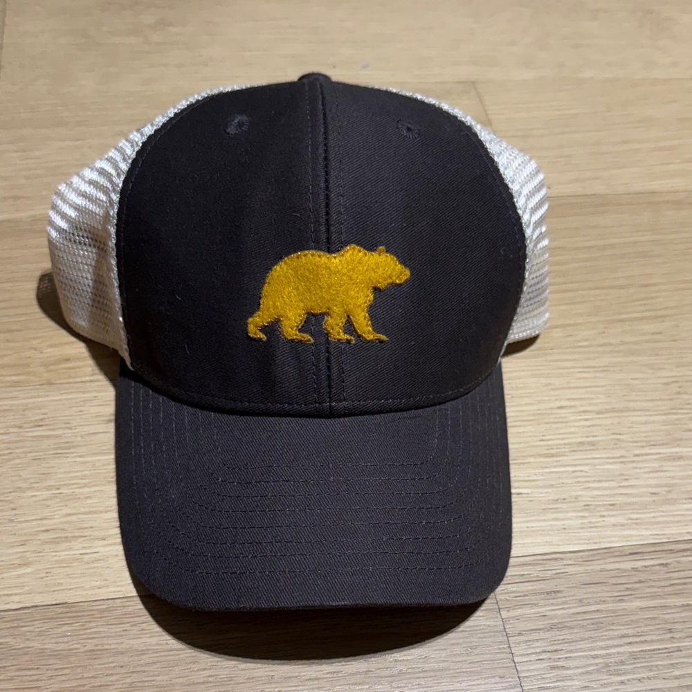 Brown and White Trucker Hat with Yellow Bear